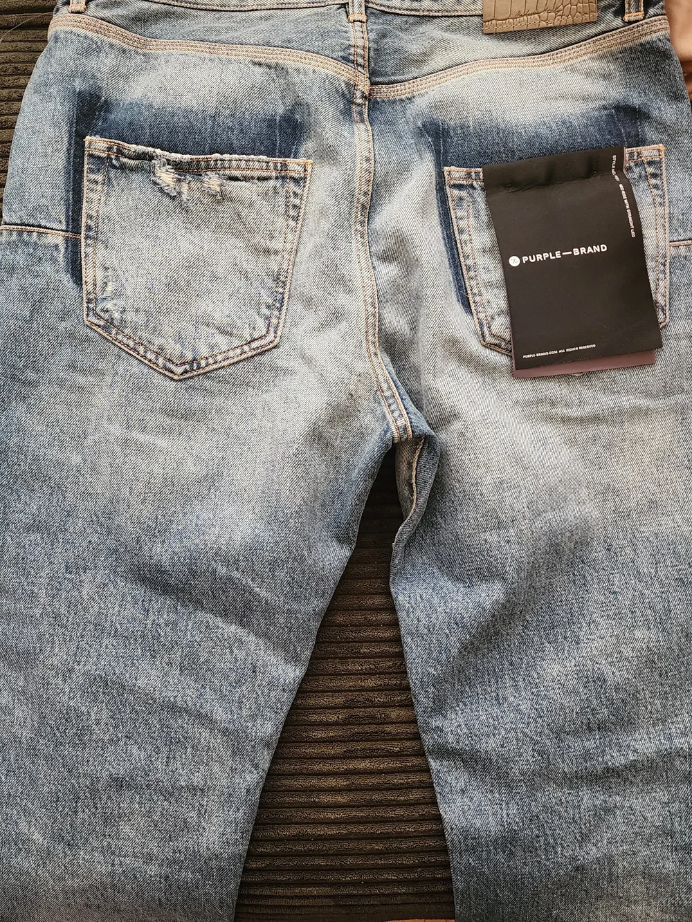 Slim Straight Distressed Light Blue Jeans